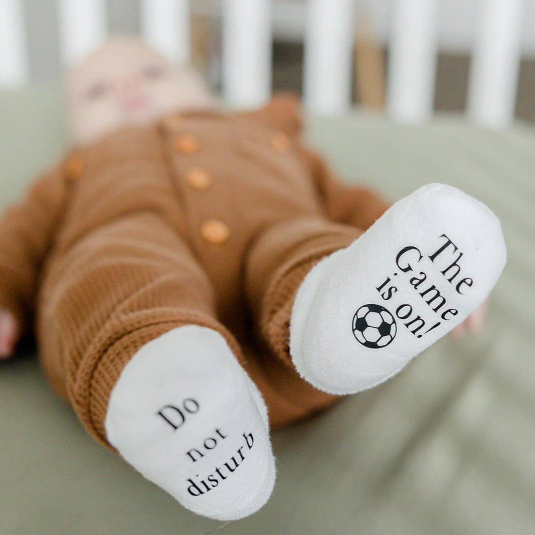 Do Not Disturb The Game is on Soccer Baby Socks