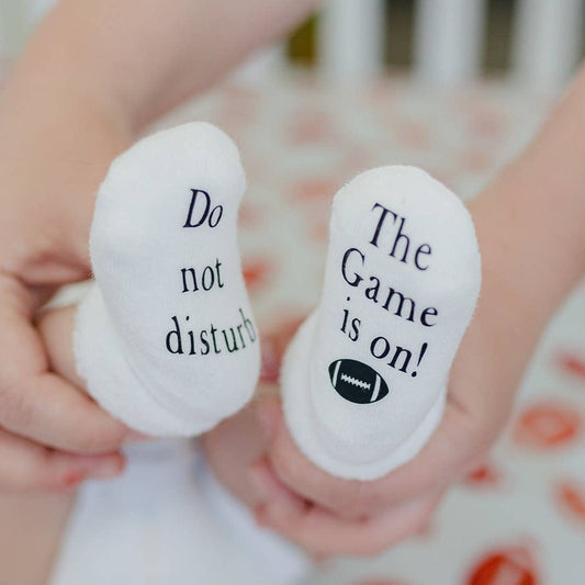 Do Not Disturb The Game is on Football Baby Socks