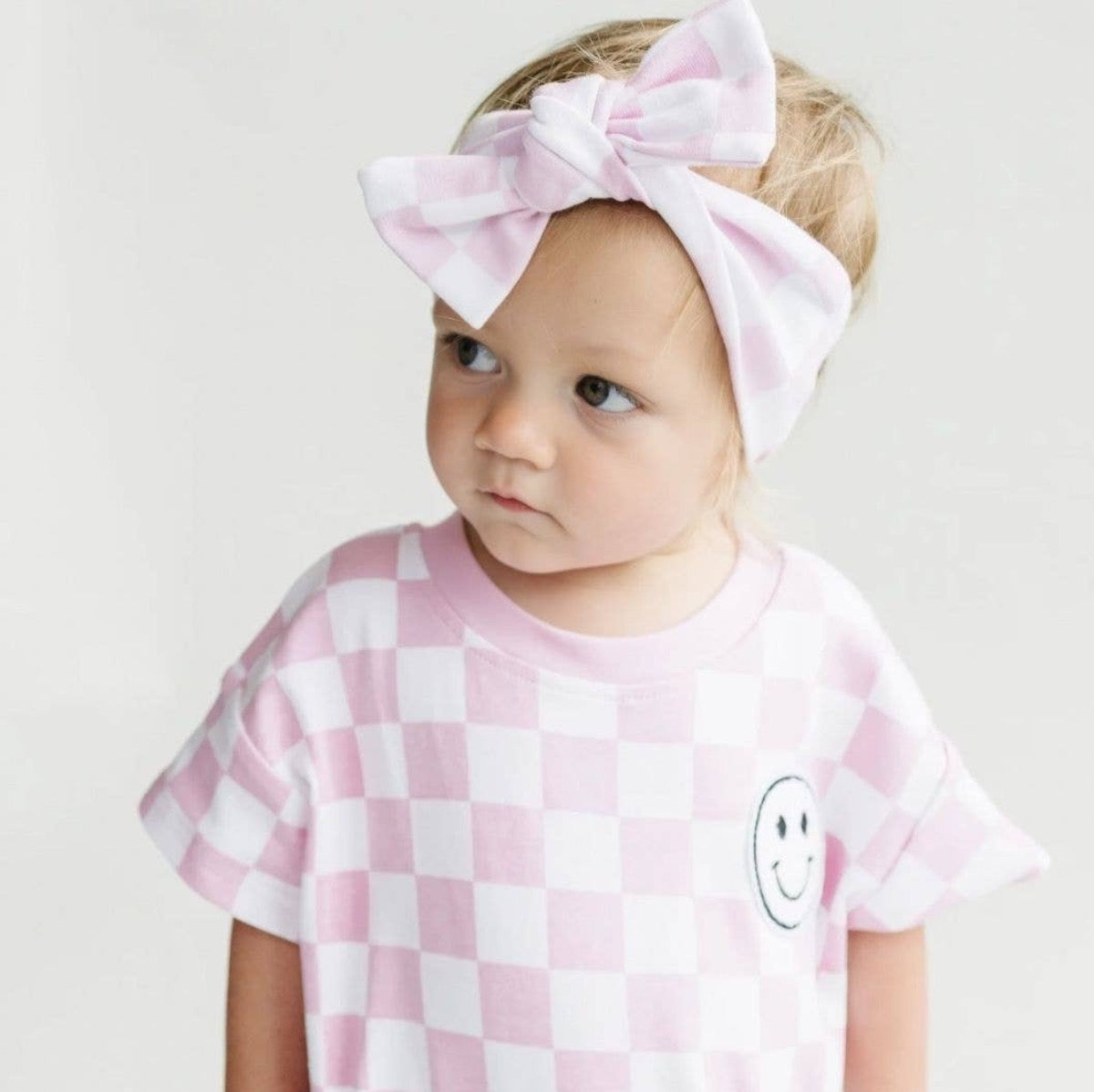 Short Sleeve Bubble Romper | Checkered Smiley Pink